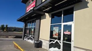Restaurant storefront windows and glass entry door in Boise, ID