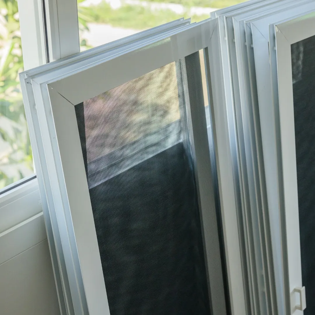 Window screens removed from frames for inspection before window screen repair in Boise, ID